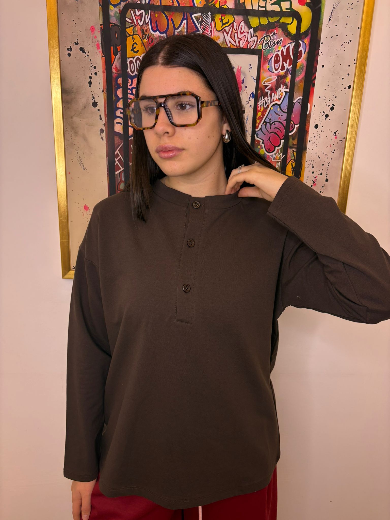 Maglia con bottoni e spalline F9945