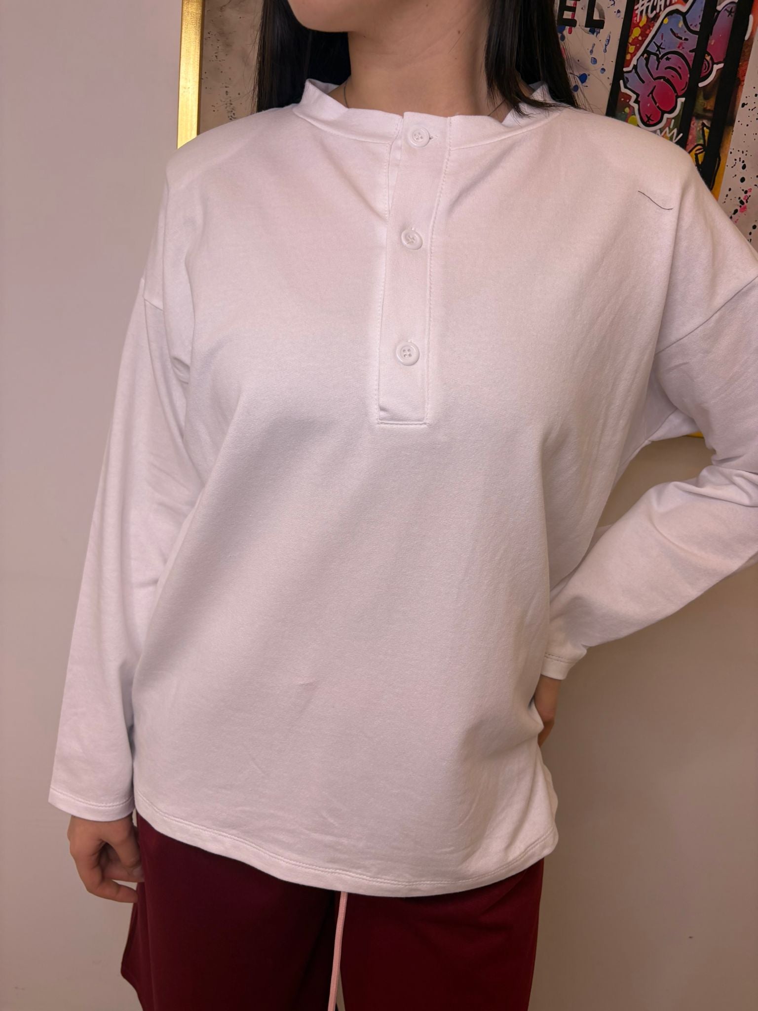 Maglia con bottoni e spalline F9945